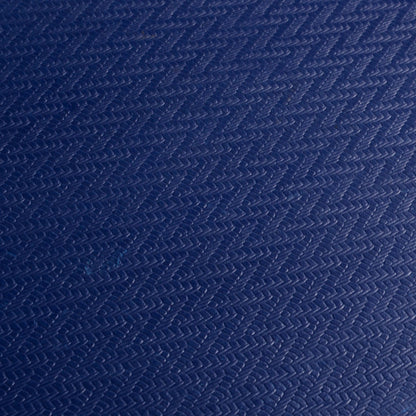Close-up of the textured blue surface of the platform dolly deck
