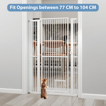 The tall pet gate is open, with a cat looking through the walk-through section