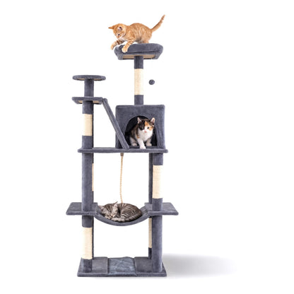 The cat tree tower with three kittens, one sleeping in the hammock