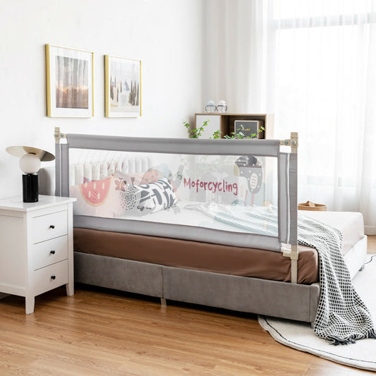 The grey bed rail guard is installed on a double bed in a child's bedroom