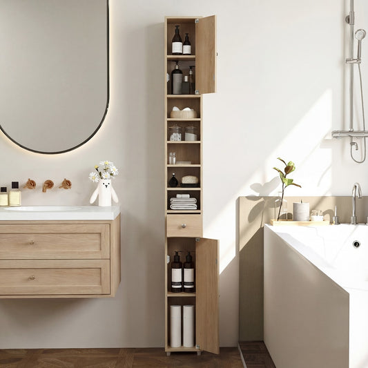Tall freestanding bathroom cabinet in a modern bathroom setting next to a sink