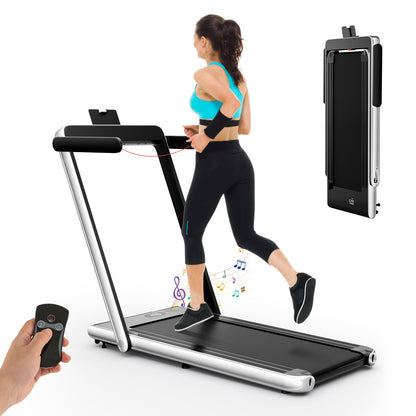 2.25 HP Foldable Treadmill running machine with a remote control in hand