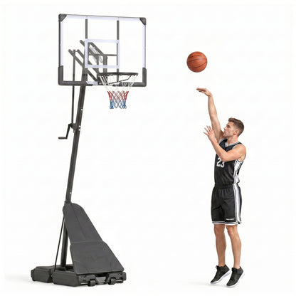 Man shooting a basketball at the portable hoop indoors