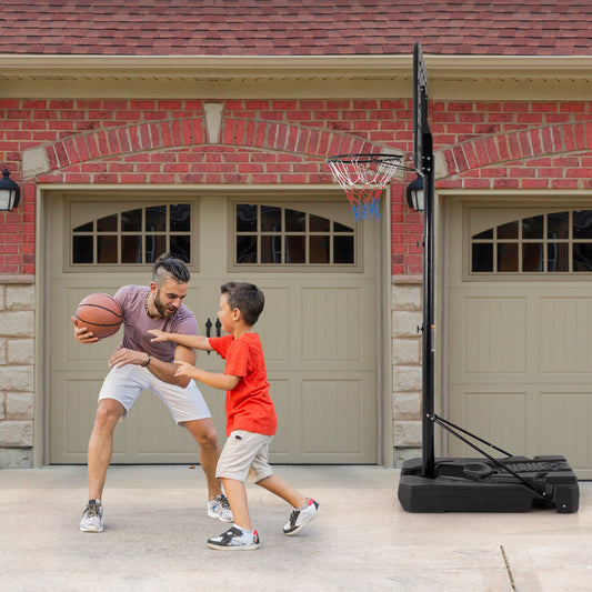 A father and son playing with the portable basketball hoop on a driveway