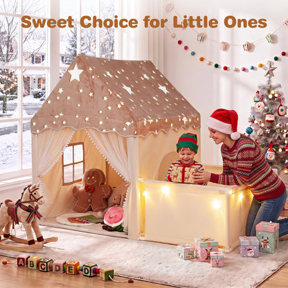 the beige play tent decorated with fairy lights in a room with festive decorations