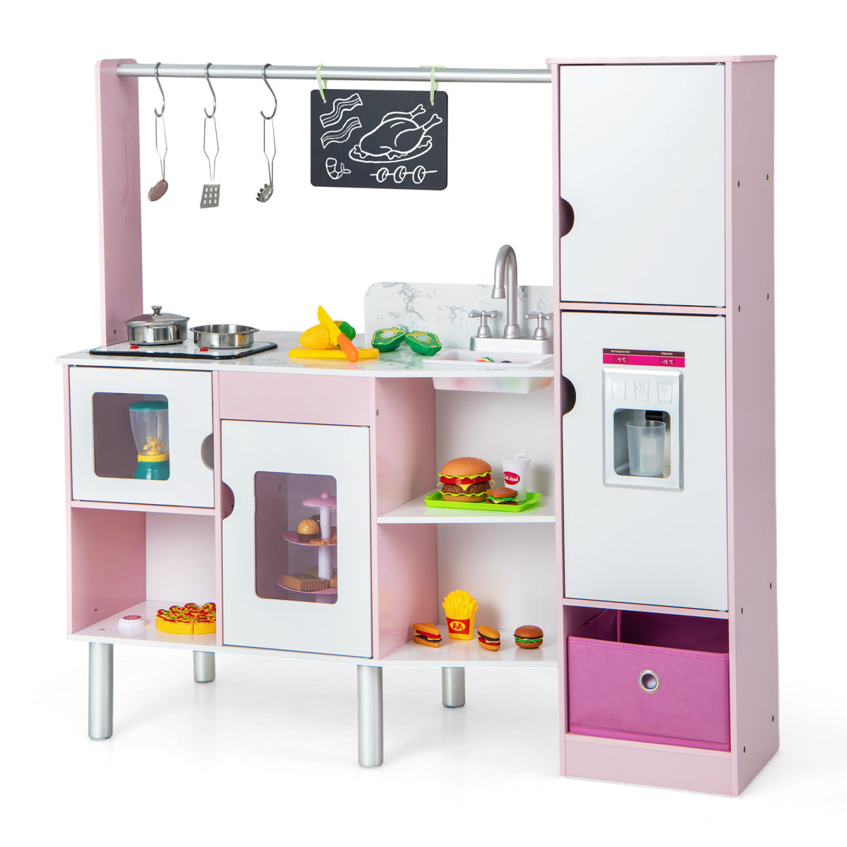 Close-up of the pink play kitchen and market set, showing the sink, hob, and food accessories