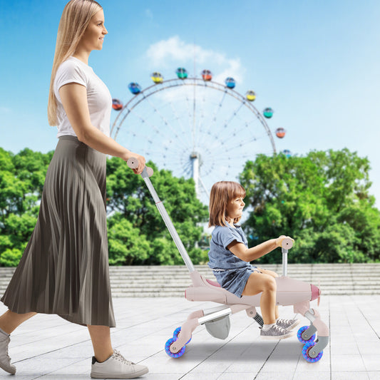 The ride on toy being pushed by an adult while a child sits on it in a park with a ferris wheel