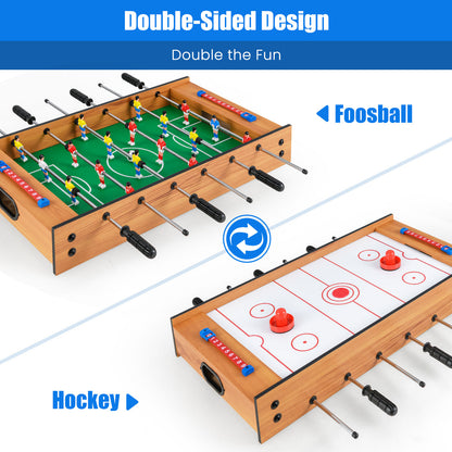 The game board demonstrating the double-sided design for switching between foosball and hockey