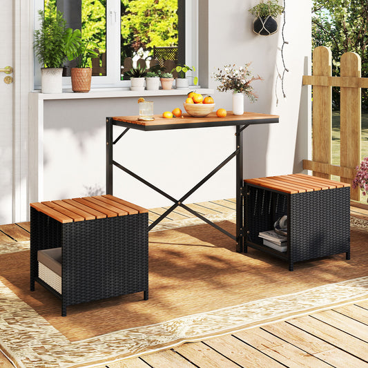 The patio furniture set set up on a rug outdoors with two benches and a table