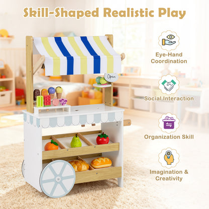 The white wooden ice cream cart has a striped canopy and display shelves