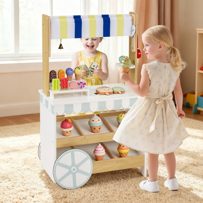 The wooden ice cream cart has two shelves displaying toy ice creams and fruit