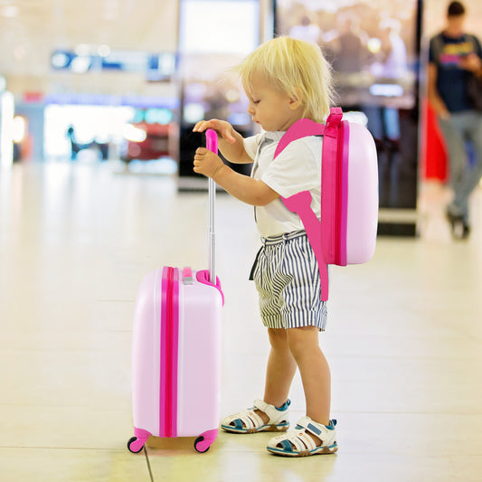 The kids luggage being pulled by a young child in an airport terminal with the backpack on