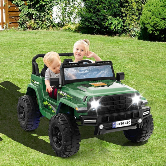 The green 2-seater ride-on car with two children enjoying a drive on a sunny day