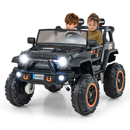 2-Seater Ride On Car, black kids electric car with two children sitting inside it