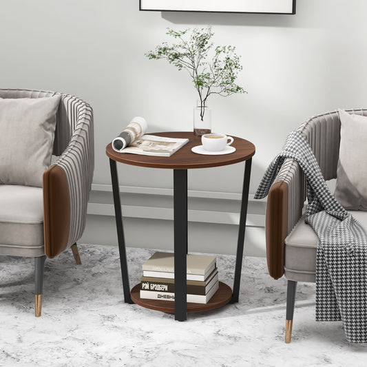 The round side table placed between two armchairs in a bright living room setting
