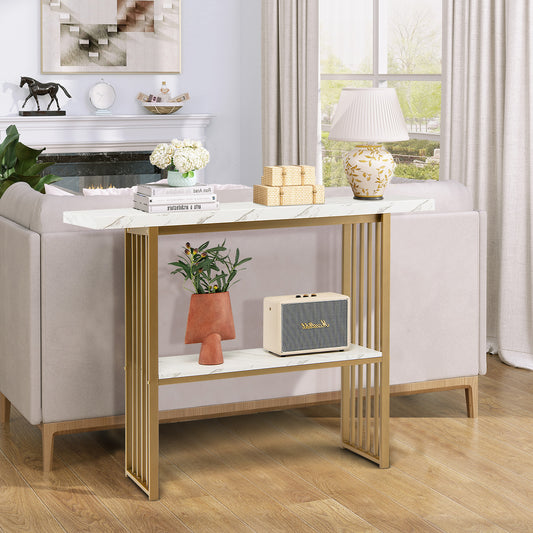 Console table in a living room setting with a sofa and lamp