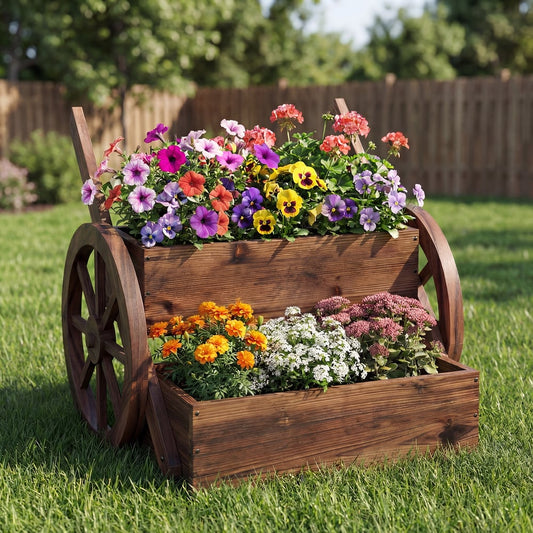 The wooden wagon planter box filled with colourful flowers, sitting on grass