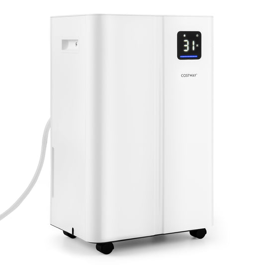 The white dehumidifier with a water drainage hose attached, showing the side of the appliance