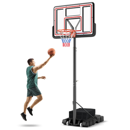A young man jumping to shoot a basketball at the adjustable hoop