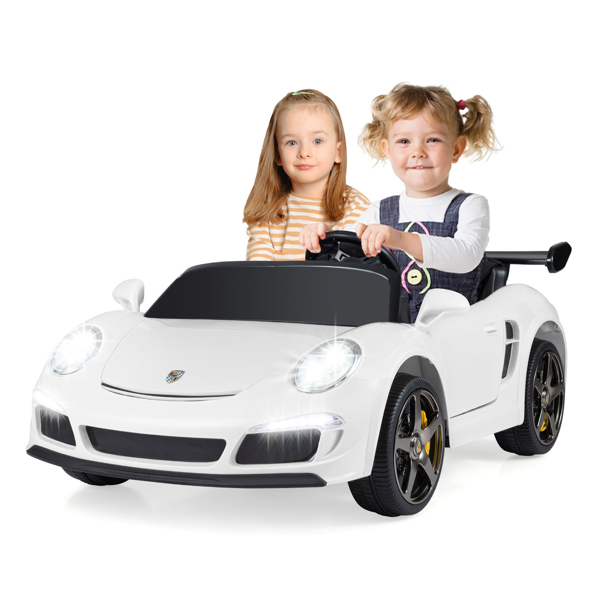 Two young children sitting in the white kids electric car