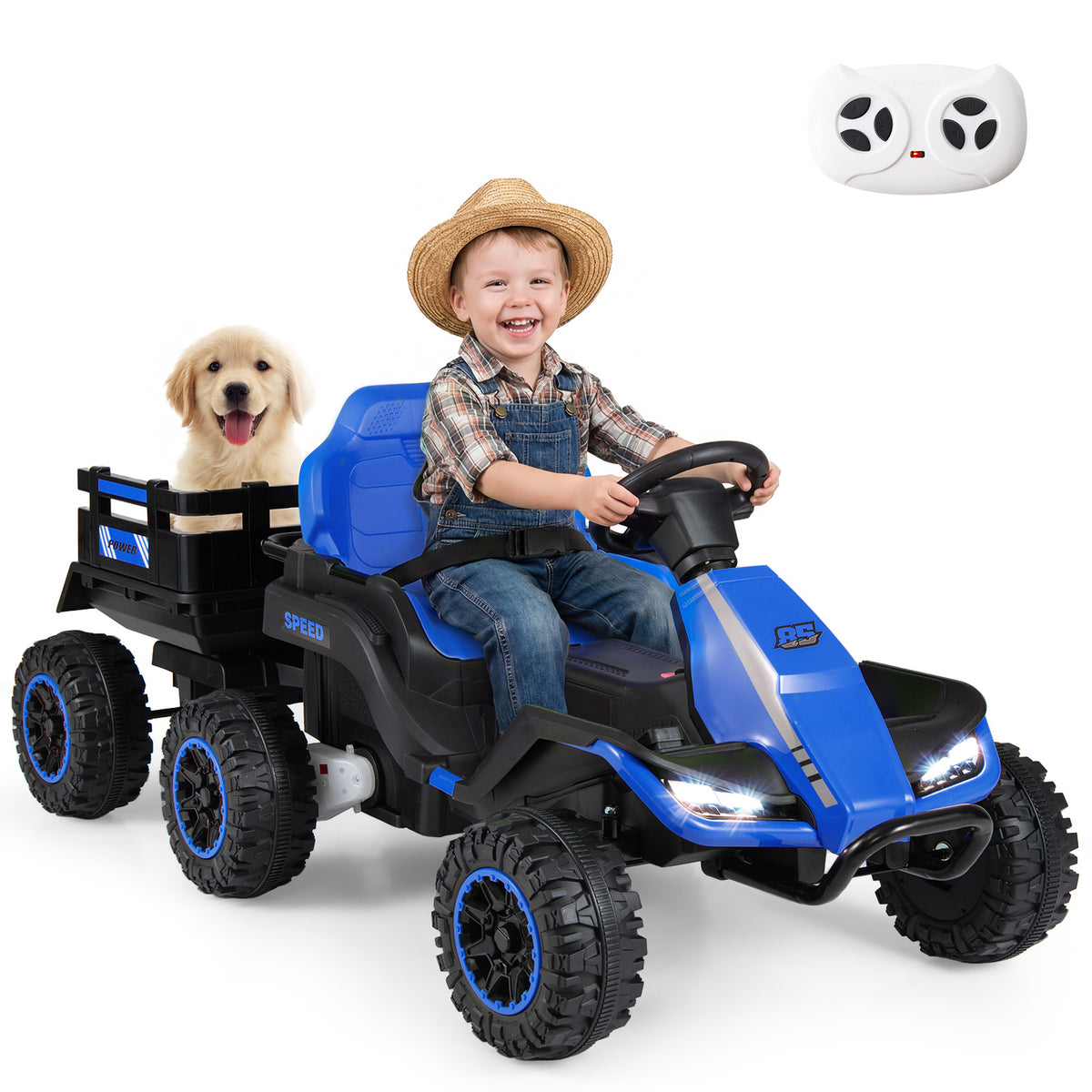 Happy child with a dog in the kids electric tractor with trailer on a farm