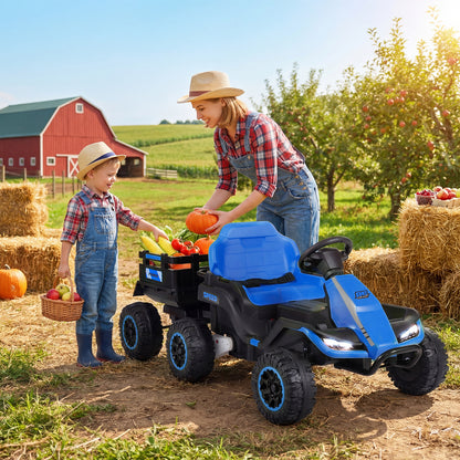 Child and adult playing with the kids electric tractor and trailer on a farm