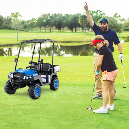 The kids electric car being used on a golf course by a father and daughter