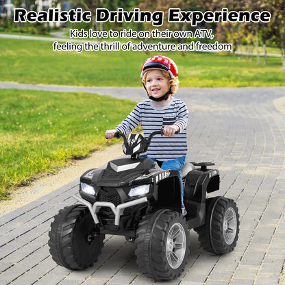 A young boy wearing a red helmet rides the black kids electric car on a paved path