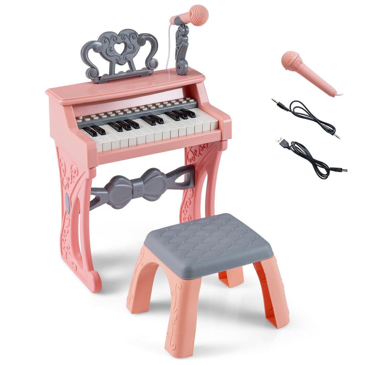 Pink keyboard piano and stool with microphone and cables