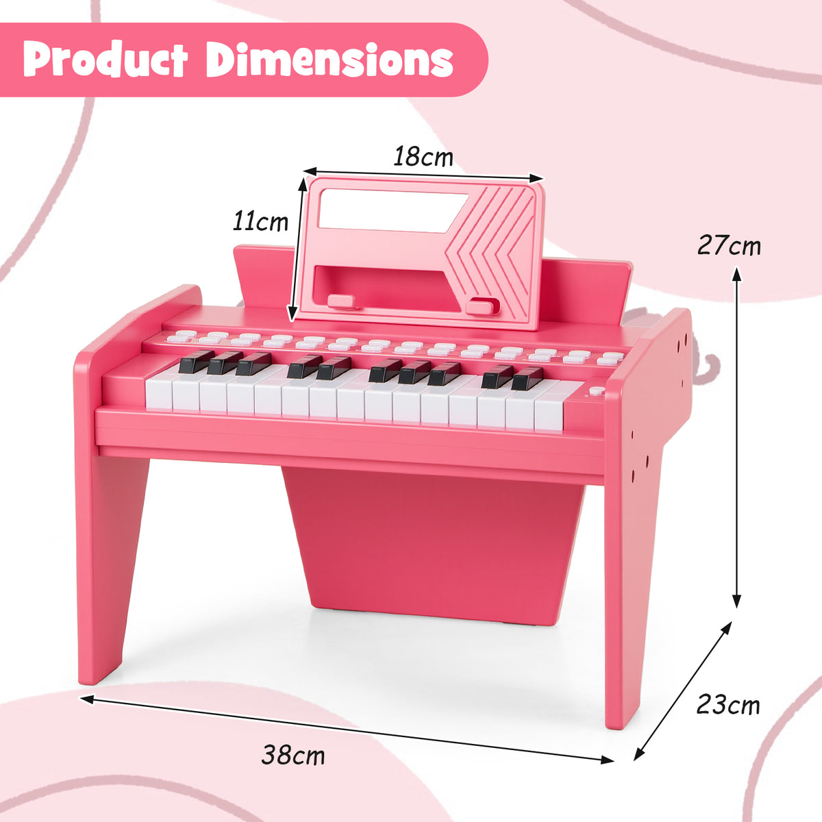 Pink wooden toy piano with dimensions shown