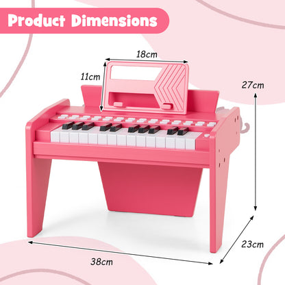 Pink wooden toy piano with dimensions shown
