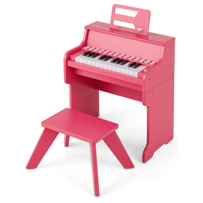Pink kids piano keyboard and stool from a side angle, showing its wooden construction