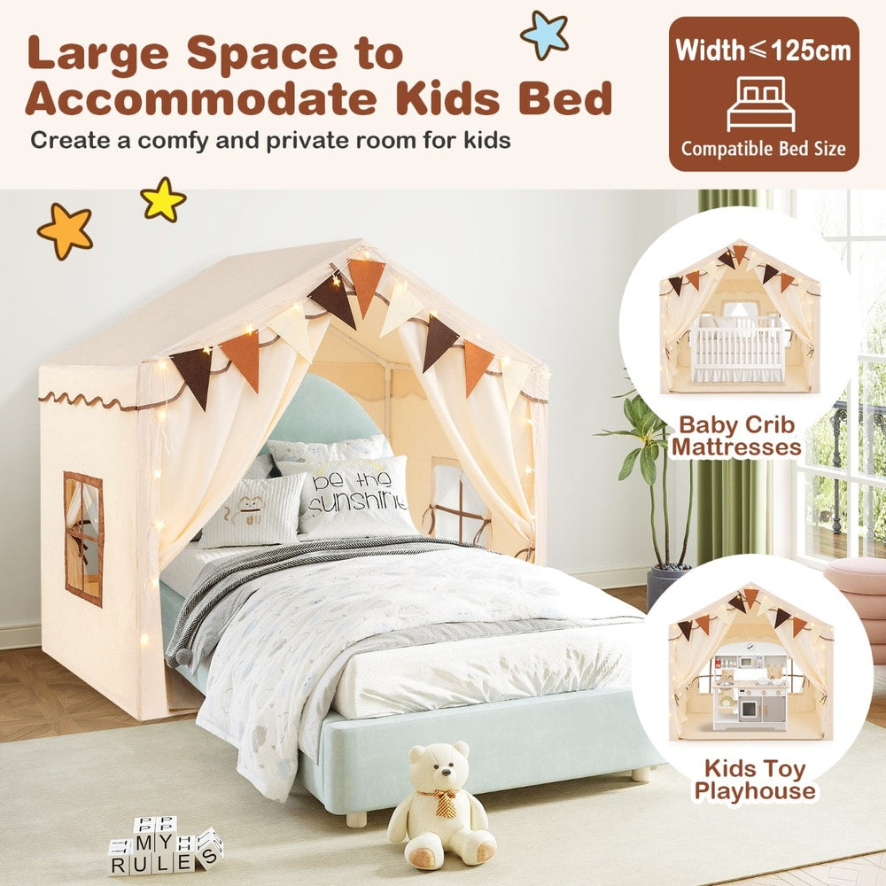 Large beige play tent house with a bed inside