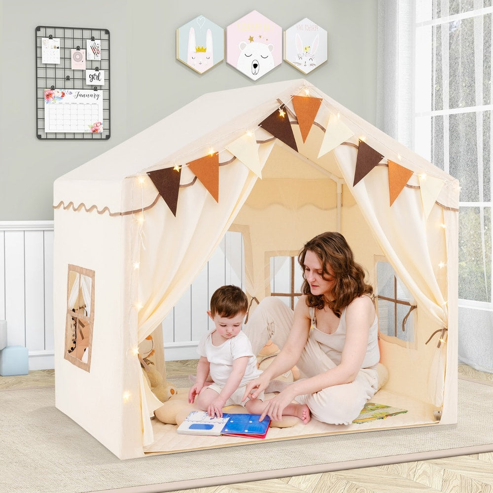 Adult and child playing inside the beige play tent house