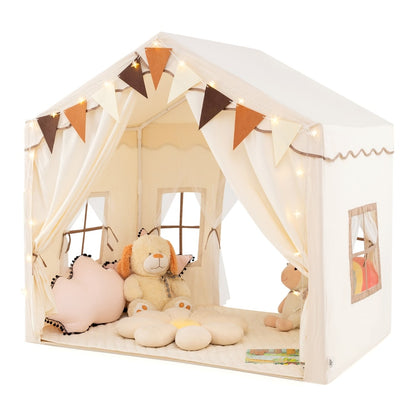 Beige play tent house with toys and stuffed animals