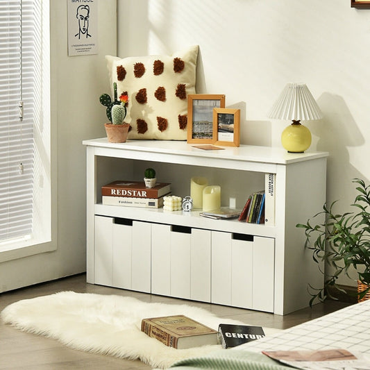 White kids storage cabinet with open shelf, styled in a room with toys and books