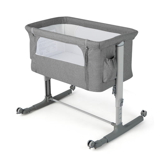 3-in-1 Adjustable Baby Bedside Bassinet with Mattress in light grey fabric with grey frame and wheels