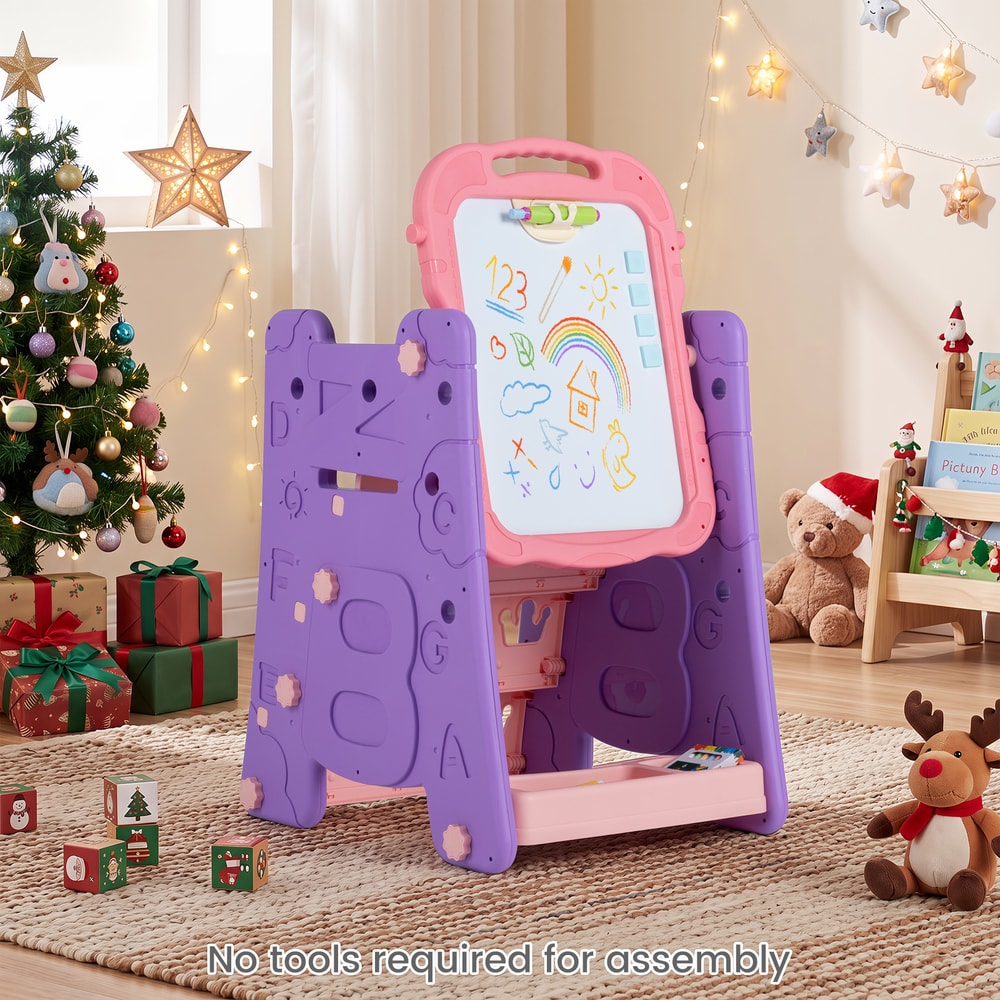Pink art easel set up in a room with Christmas decorations