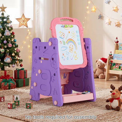 Pink art easel set up in a room with Christmas decorations