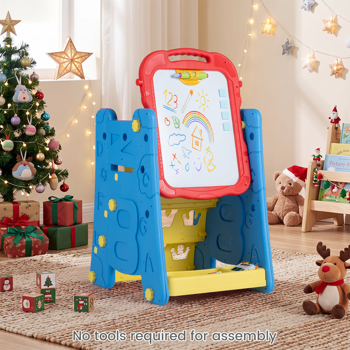 The blue and yellow art easel with a Christmas tree and presents