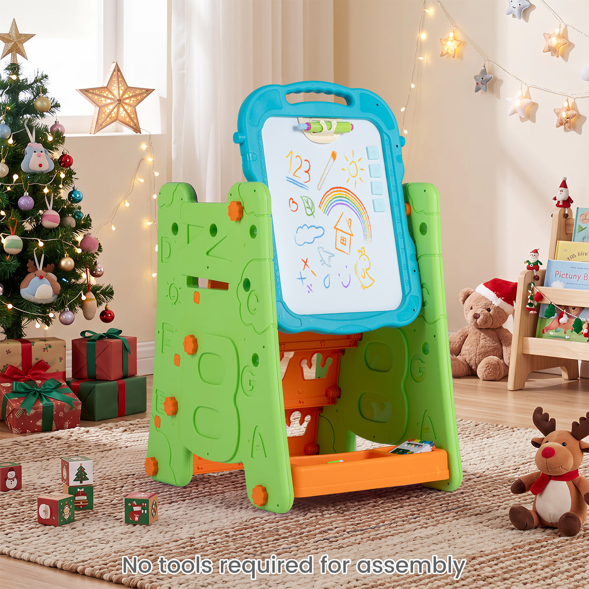 The art easel set up in a living room with Christmas decorations and a teddy bear