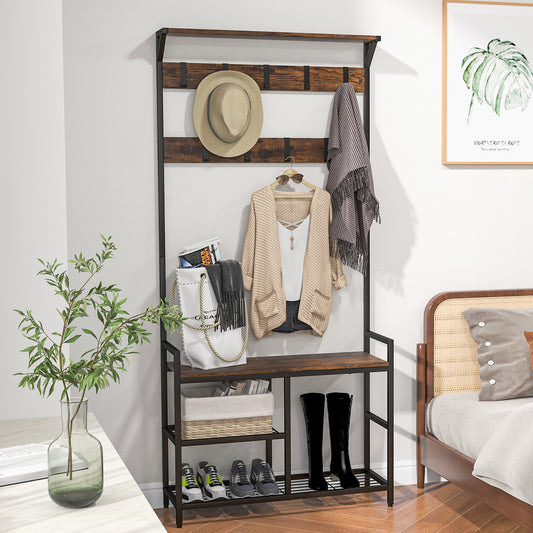 The coat rack with a hat, bag, scarf and jacket hanging on the hooks and shoes on the shelves