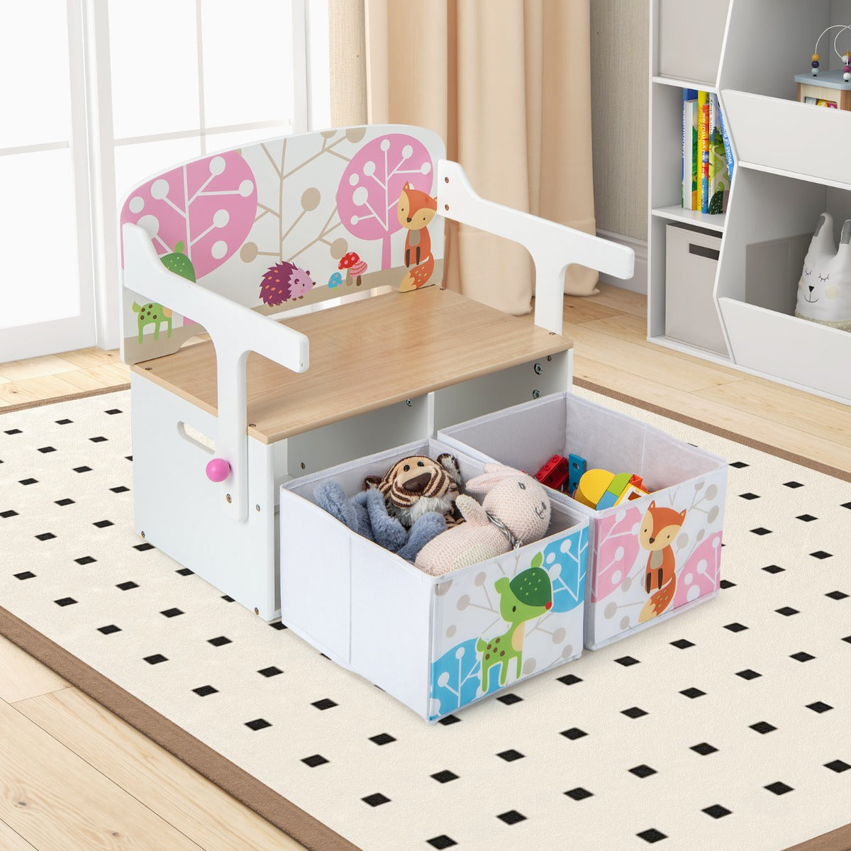 The kids convertible activity bench with storage bins pulled out
