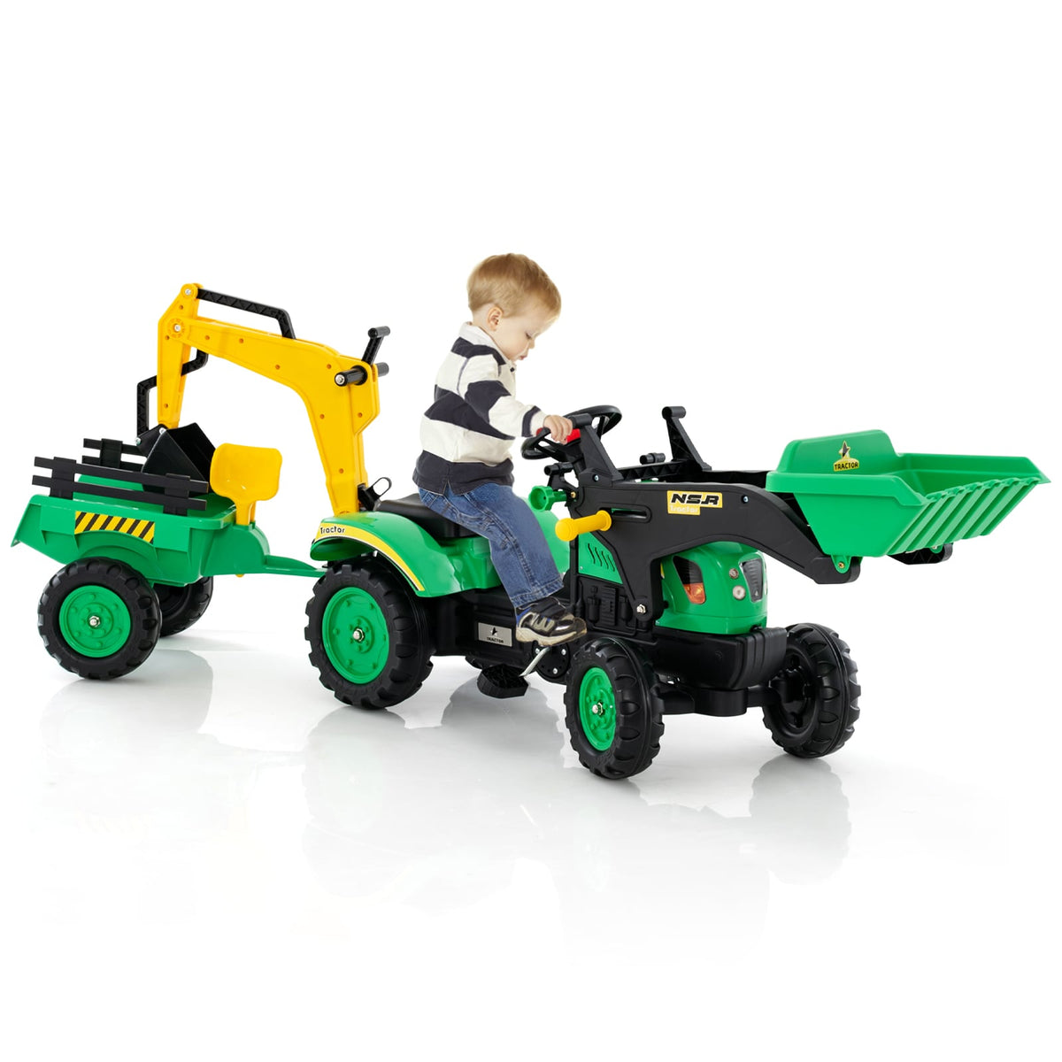 Side view of the green pedal excavator toy with detachable trailer and a child seated