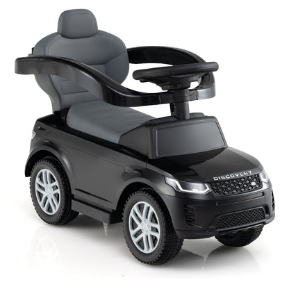Rear view of the black push and pedal ride on toy with a high back seat