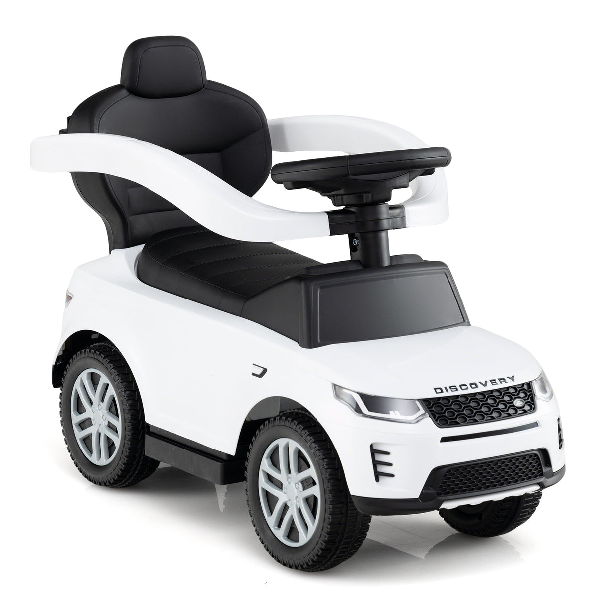 The white push and pedal ride on toy viewed from the side with the seat and handle