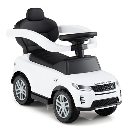 The white push and pedal ride on toy viewed from the side with the seat and handle