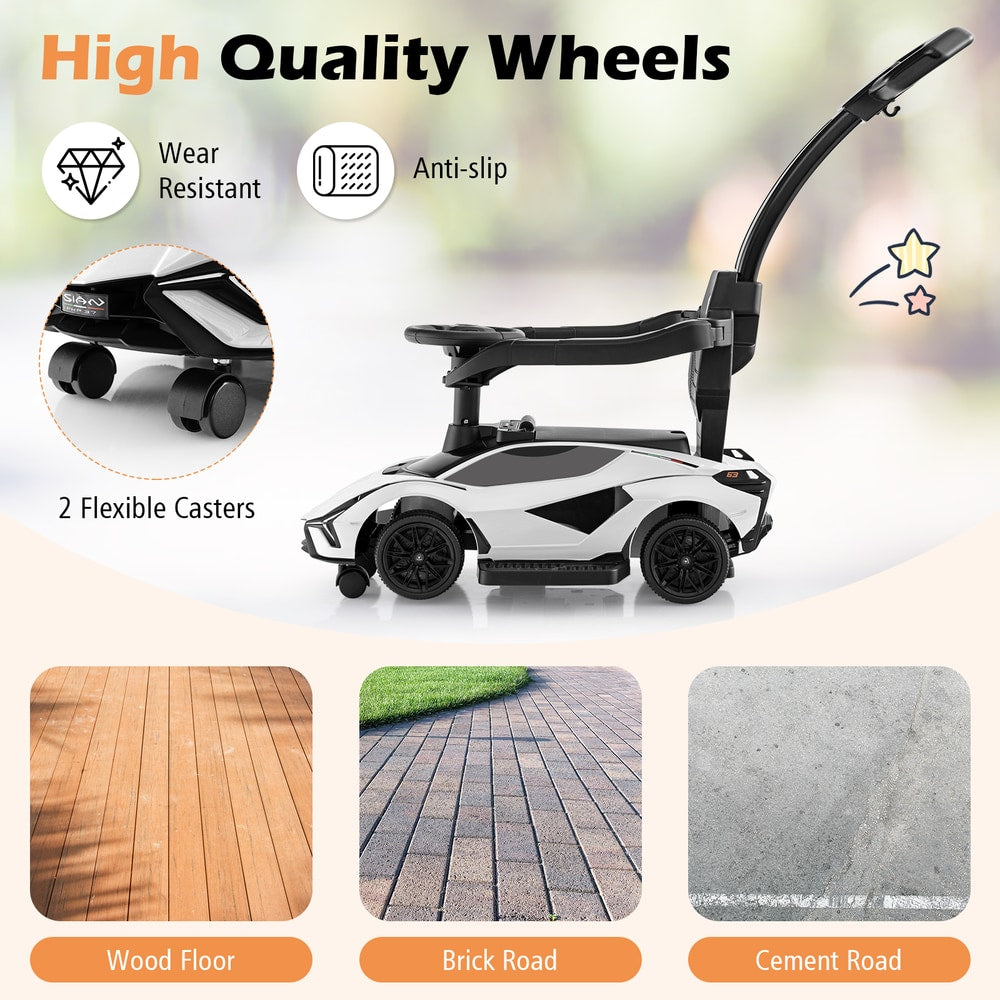 Wheels of the white 3-in-1 ride on push car on wood, brick and cement