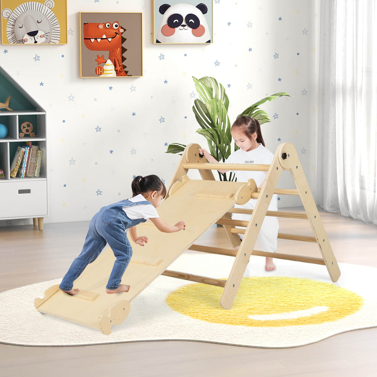 Two children playing on the wooden climbing frame with a slide in a bright nursery room