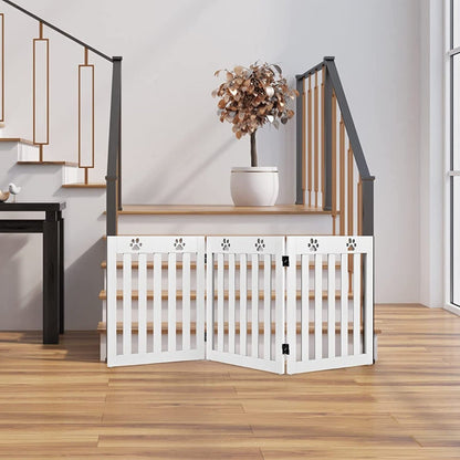 The white pet gate is set up at the bottom of a staircase in a modern home